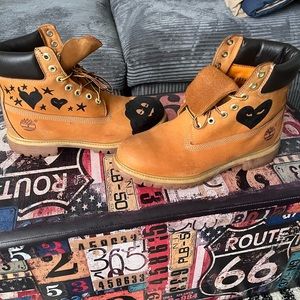 Worn Men’s Timberland Boot. Art work on the boot.